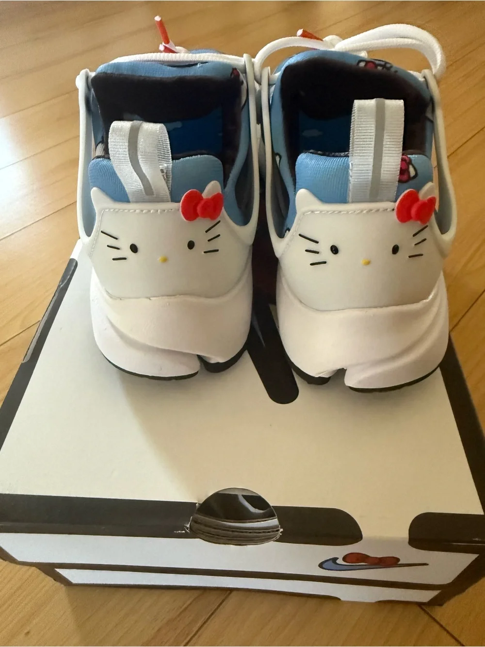 Nike Big Kids Light Blue Hello Kitty Graphic Sneakers with White Accents